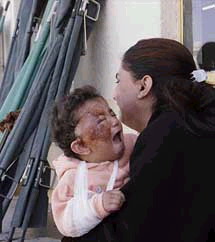 la-guerre-en-irak-troisieme-journee/irak-22-mars-femme-enfant4375.jpg